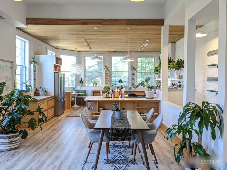  Kitchen/Dining area with bright, natural lighting and lush greenery 