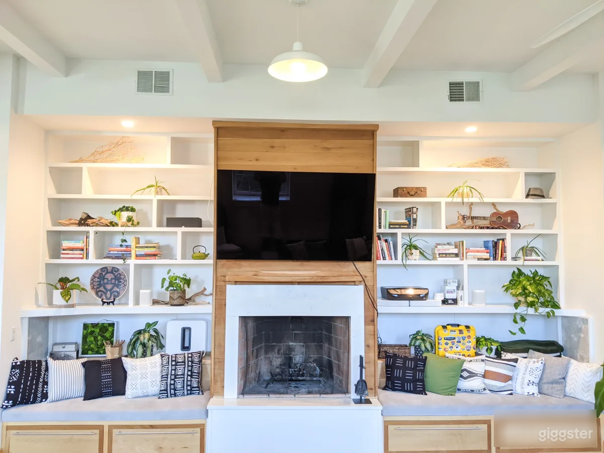 True wood burning fireplace with custom shelving 