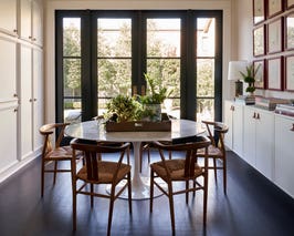  Breakfast room with French doors that open to the backyard. 