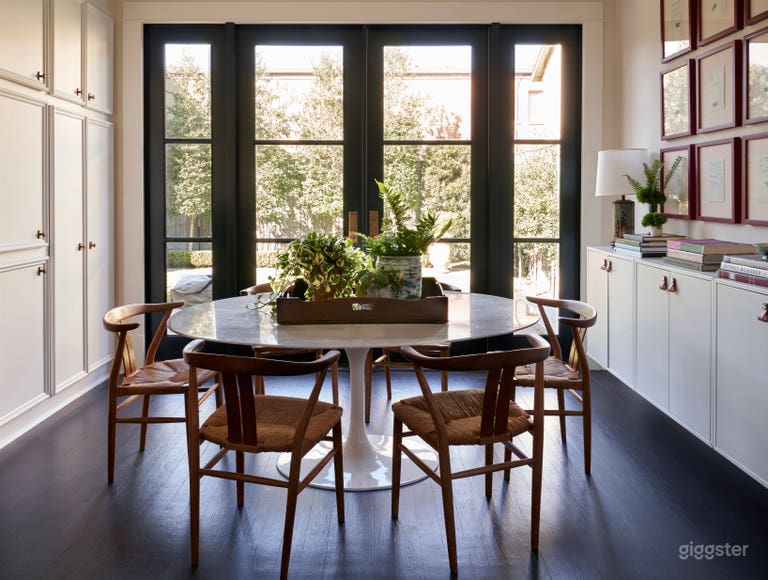  Breakfast room with French doors that open to the backyard. 