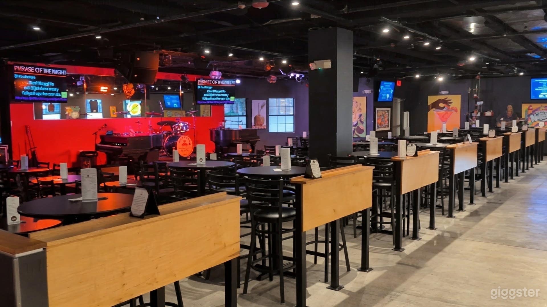 Welcoming space with local art, AV equipment, and full bar. Photo 4