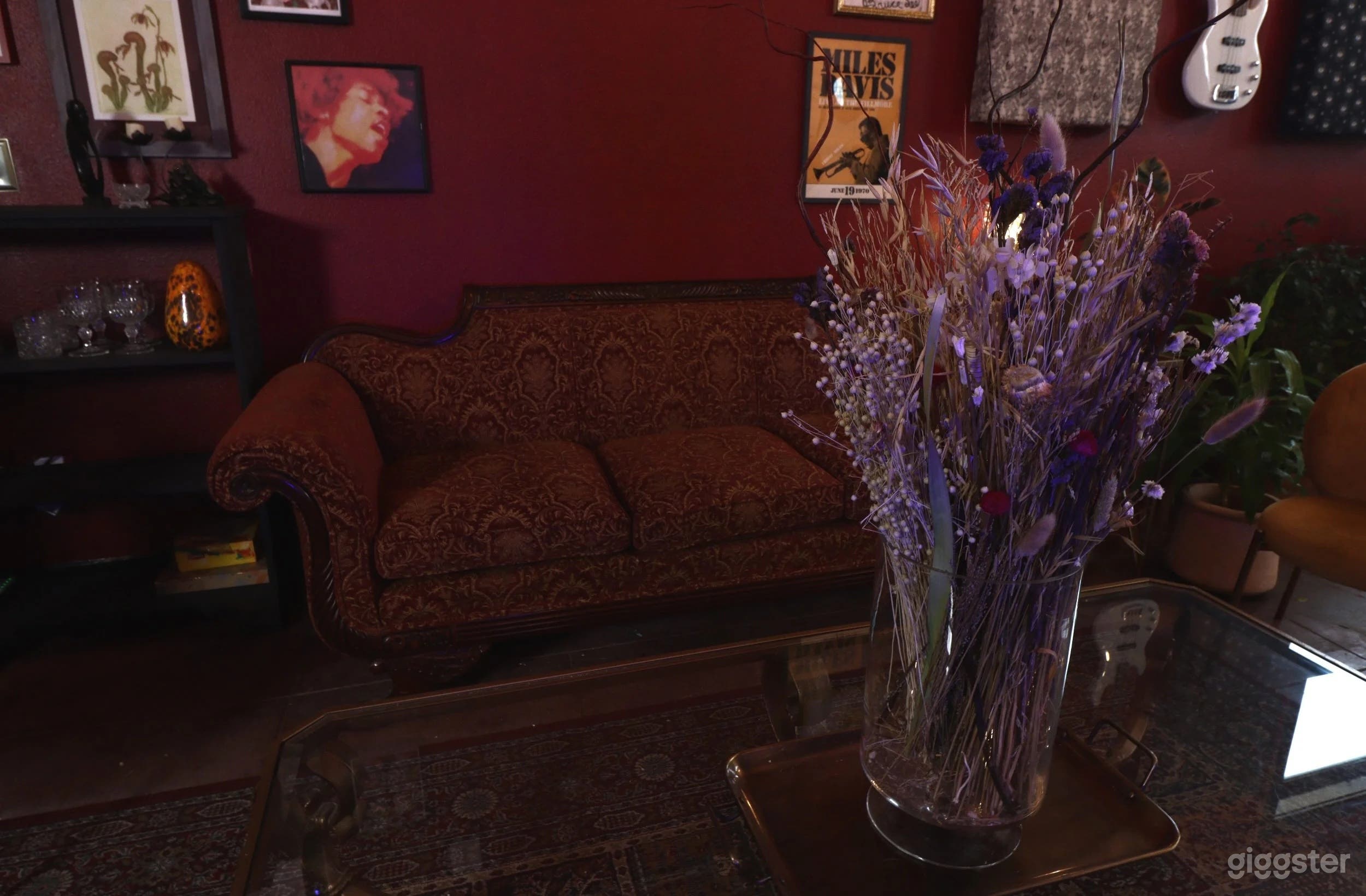 Seating area number two is decked in rouge and gold.