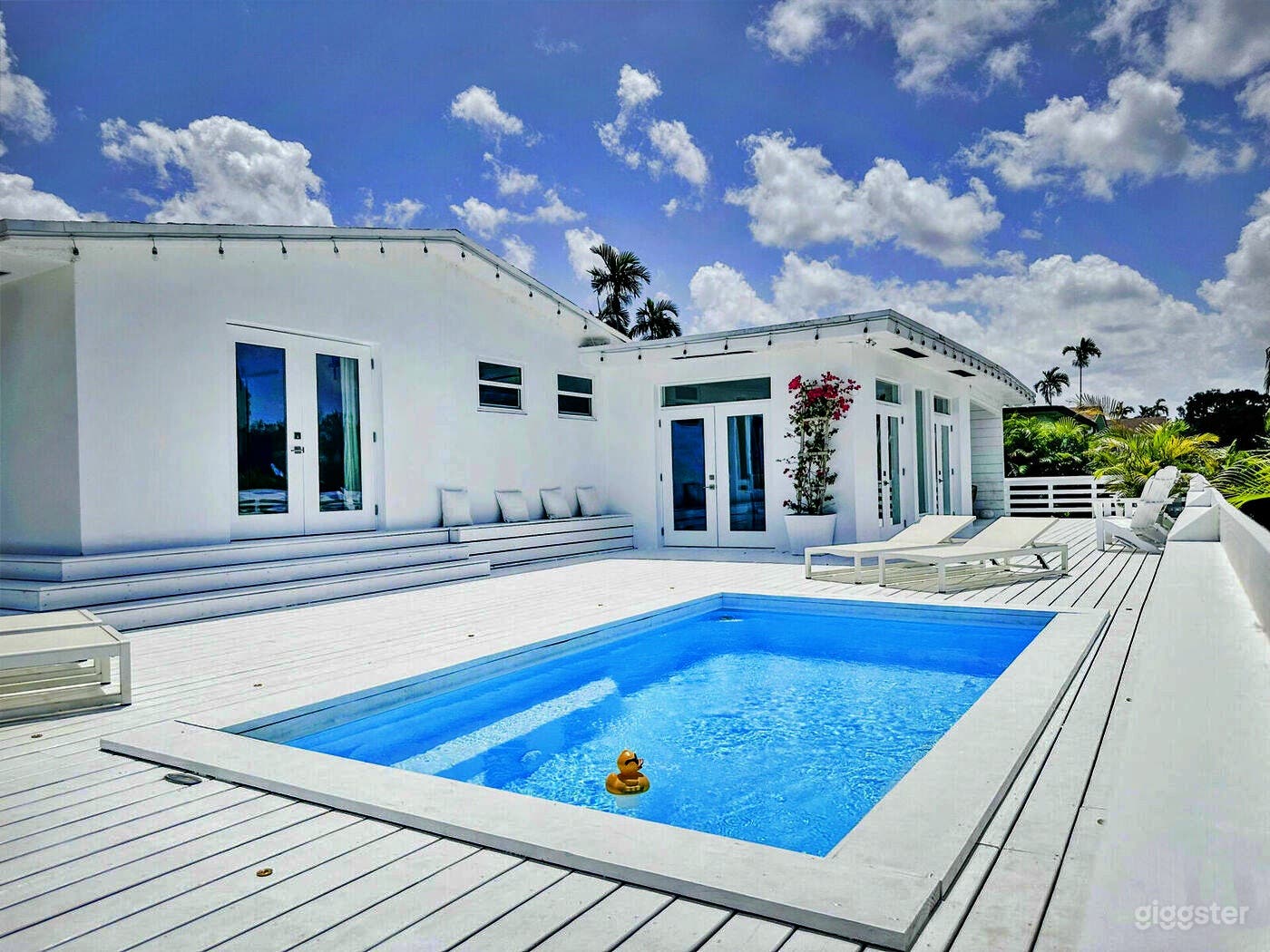 Charming Pool with Deck and Backyard Photo 1