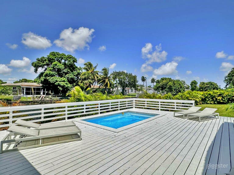  Charming Pool with Deck and Backyard 