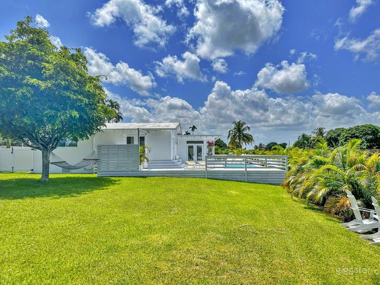  Charming Pool with Deck and Backyard 