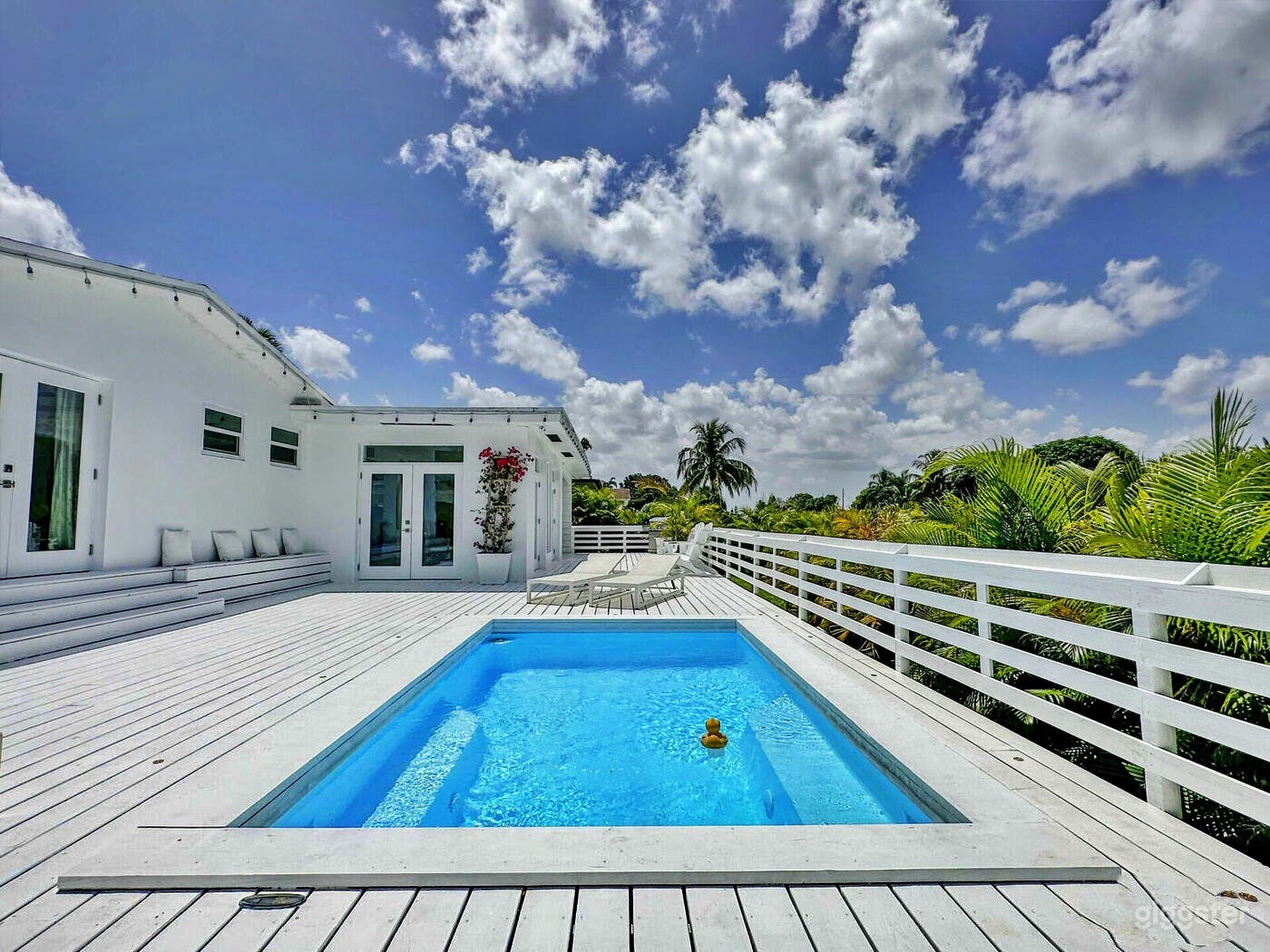 Charming Pool with Deck and Backyard Photo 4