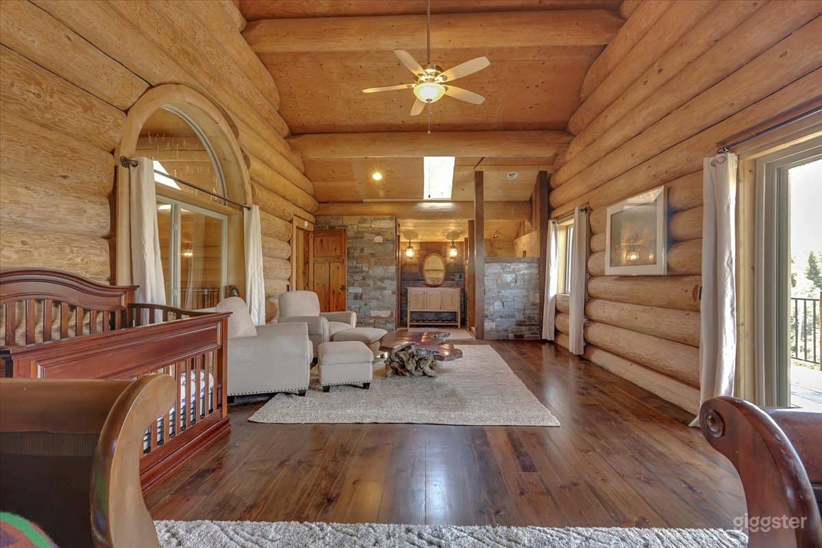 Primary Bedroom with crib and two queen beds - en-suite. 