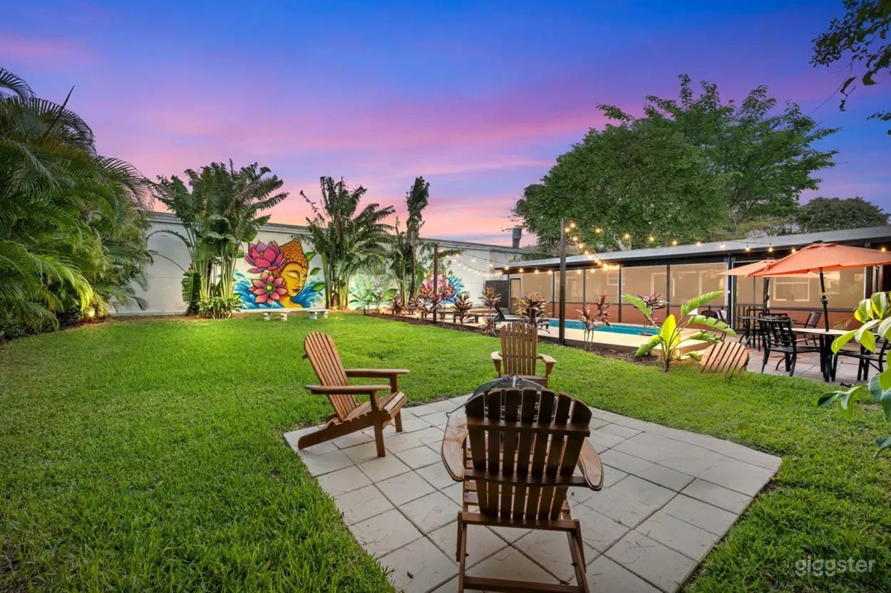 Vibrant Backyard Oasis with Pool, Art Murals & Lounge Areas Photo 1