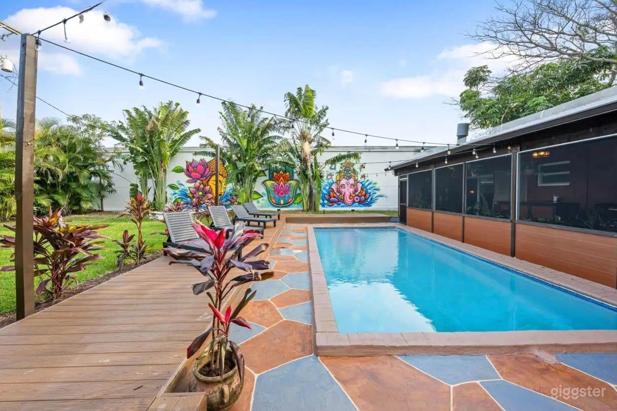 Vibrant Backyard Oasis with Pool, Art Murals & Lounge Areas Photo 3