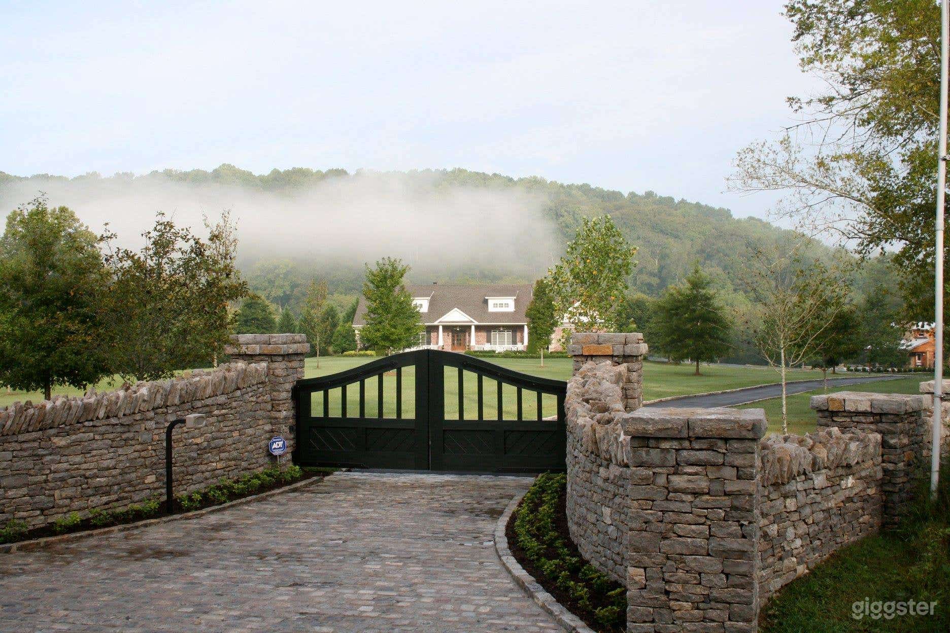 Gated entrance to the property. There is a separate driveway and entrance for event parking and vendors.