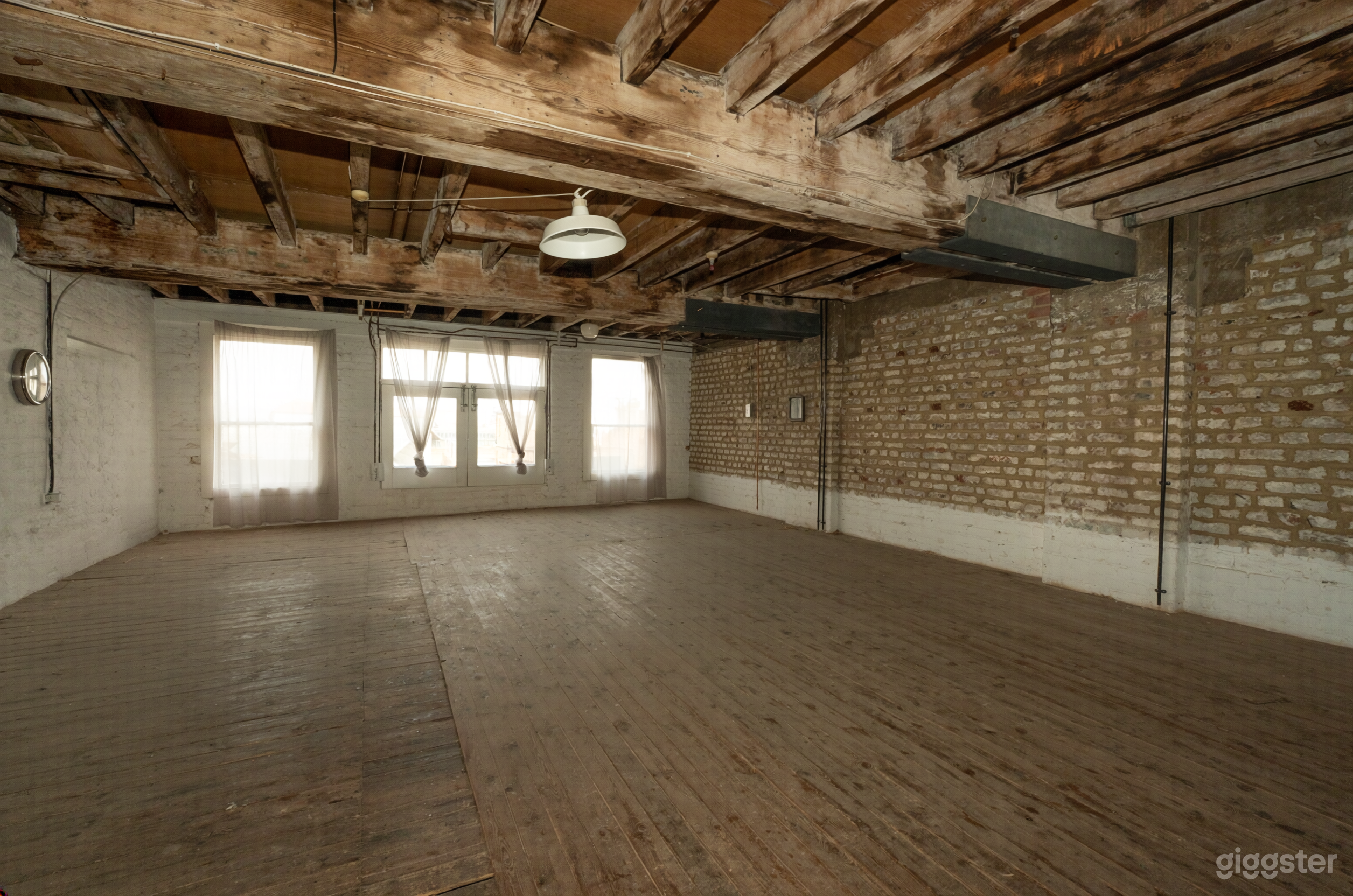 Industrial Building with Lofts, Brick & Natural Light Photo 1