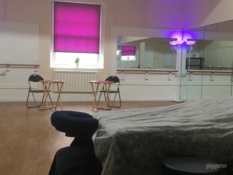  Mirrored wall on one side of the studio. Lots of natural light from the window and roof.  