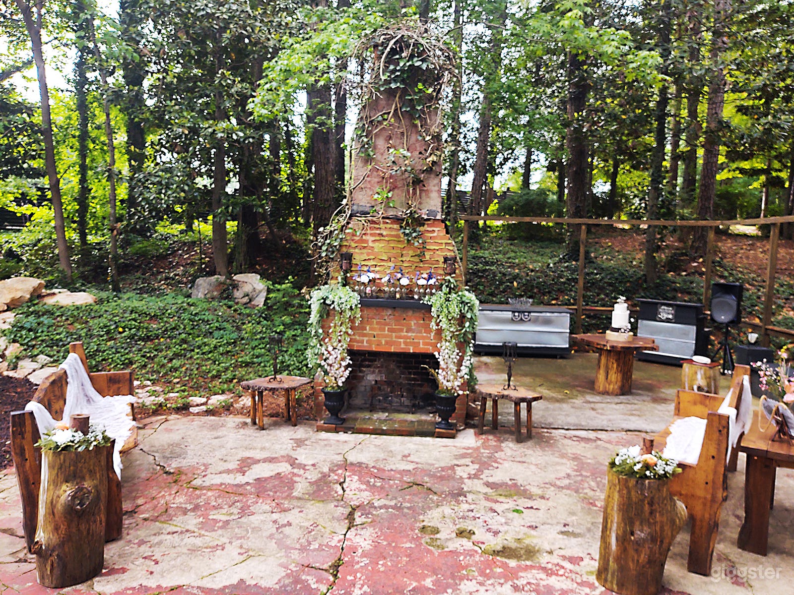 Pristine Chapel Lakeside, outside fireplace ceremony area