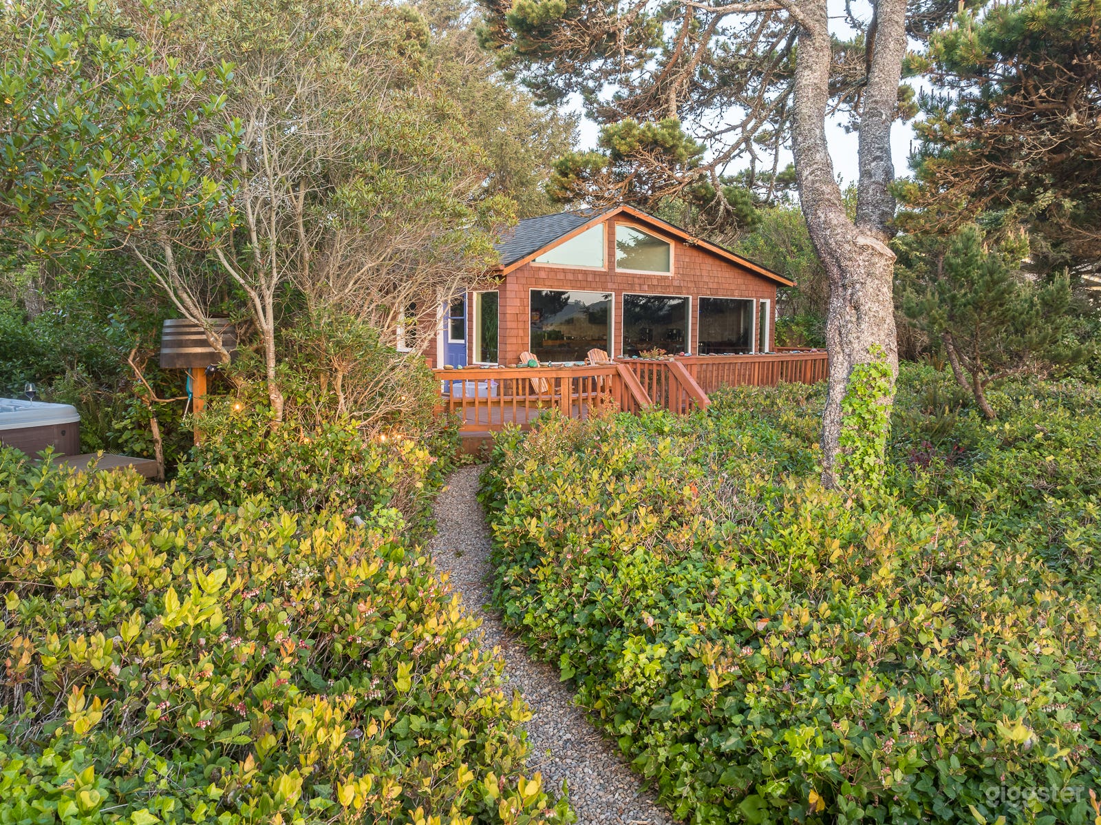 View of ocean side of house looking from bluff.