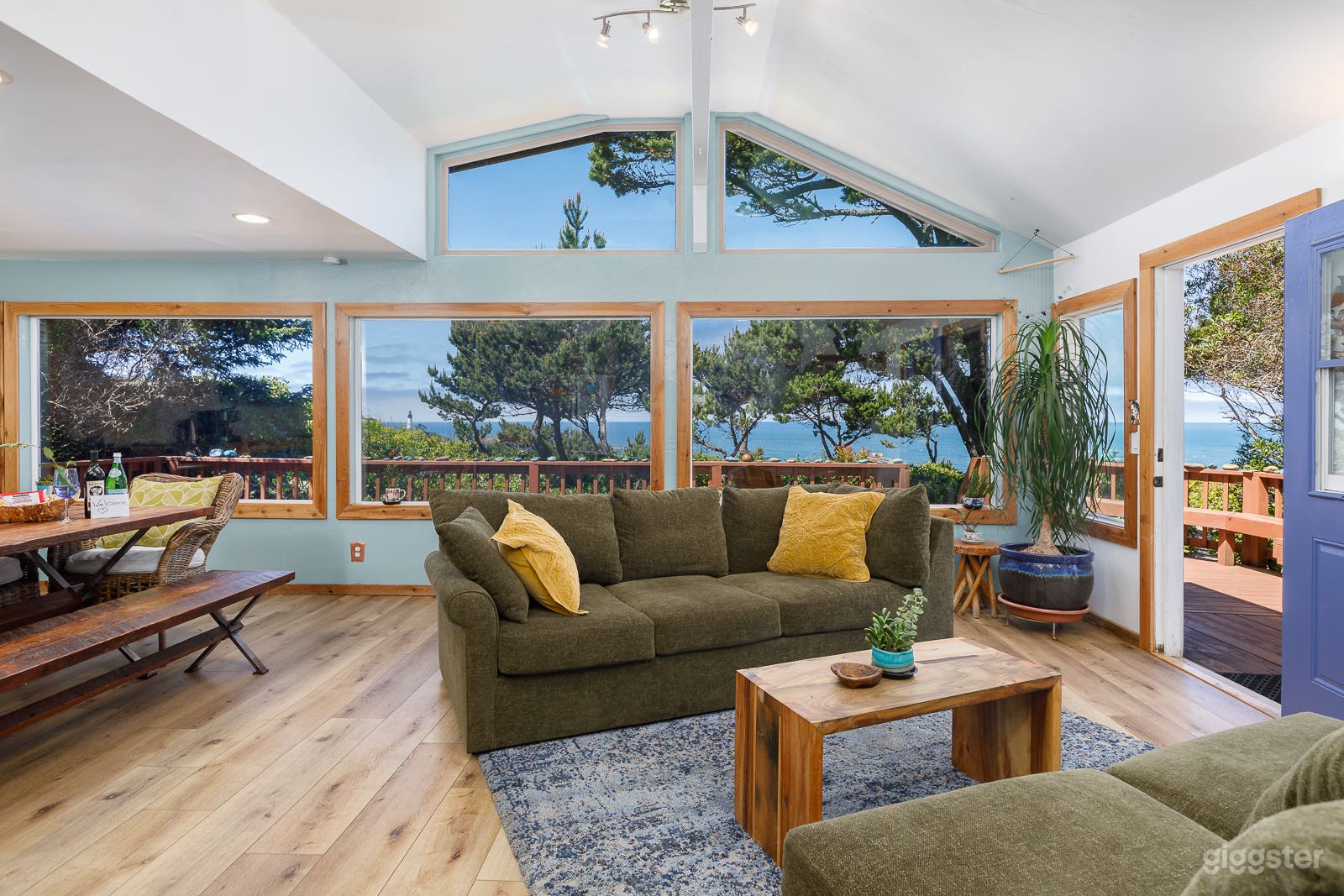 Living room with view of ocean and Yaquina Bay Lighthouse