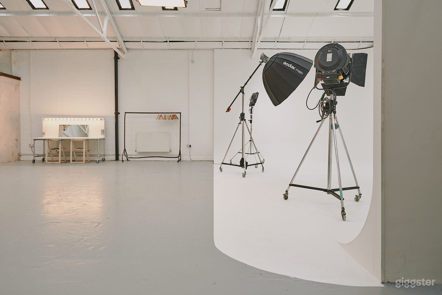 Whitehouse 70s Cove Studio in Industrial Warehouse Photo 2