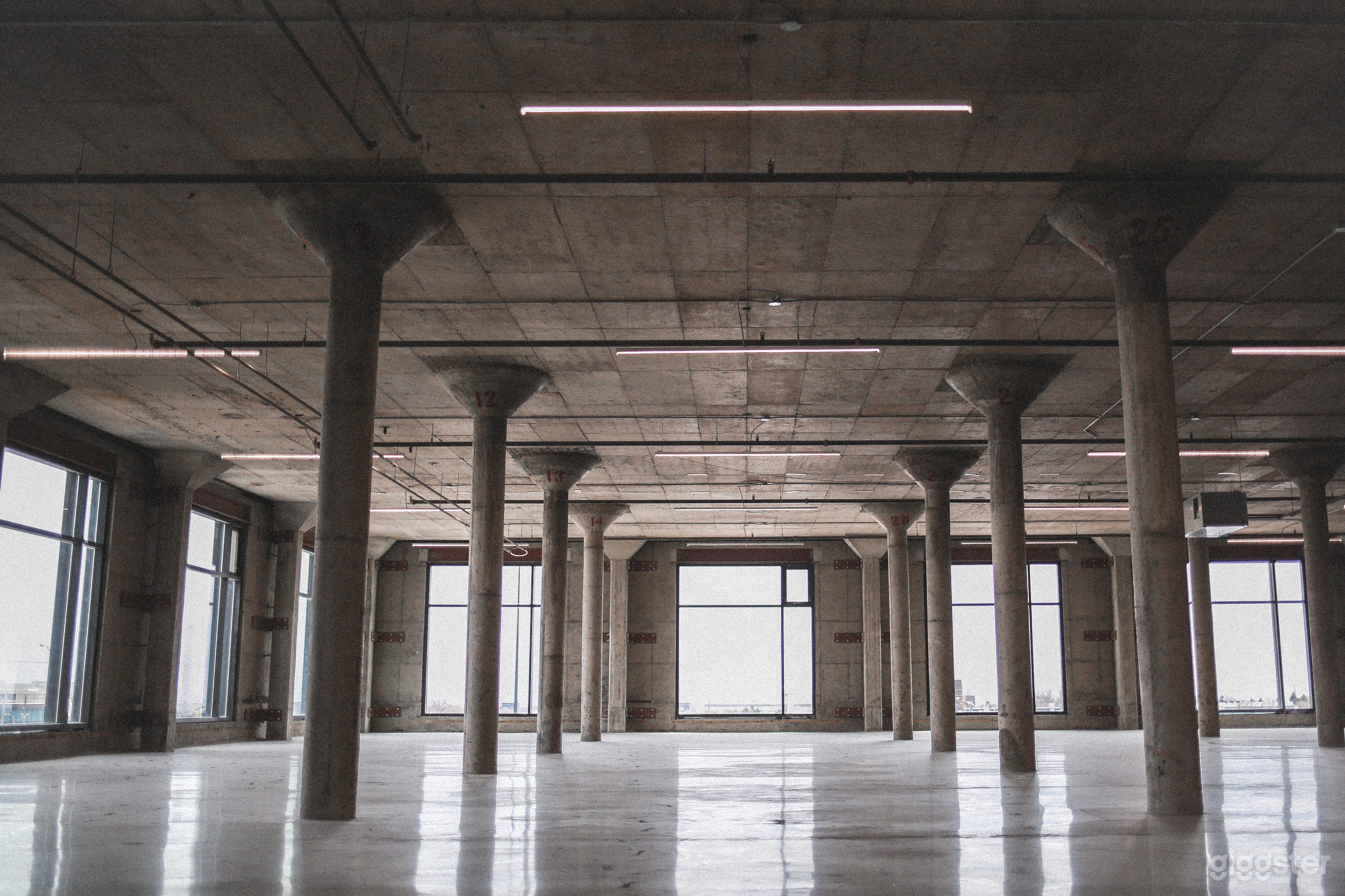Light-filled concrete warehouse Photo 1