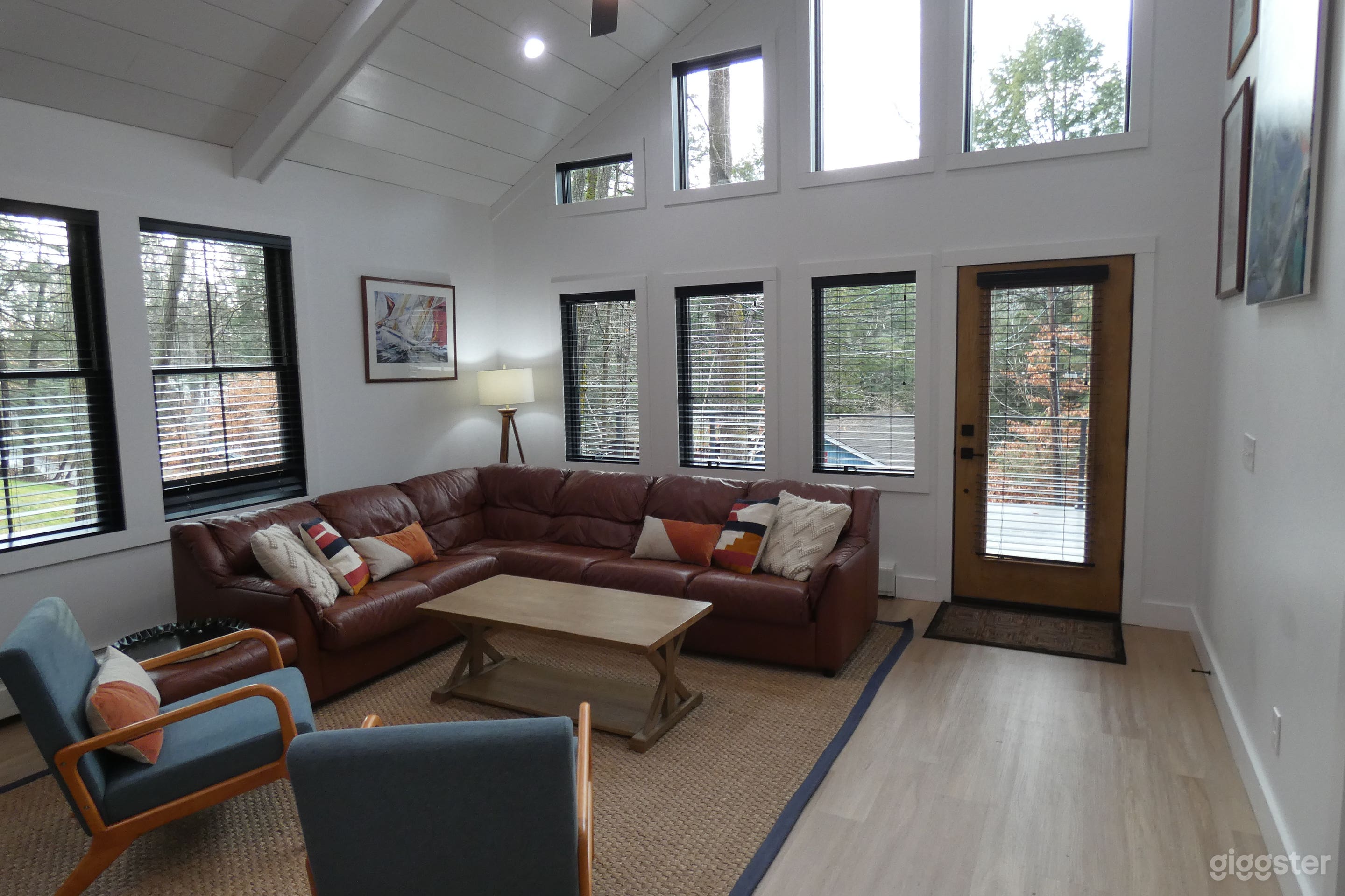 Living room with floor to ceiling windows