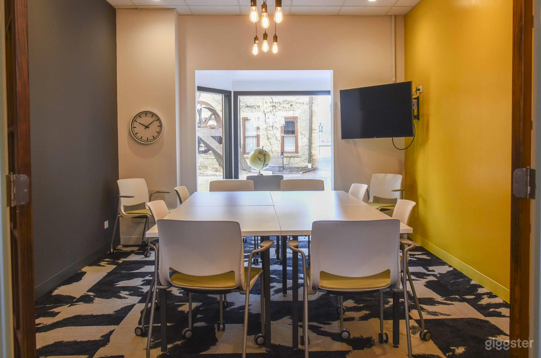 Conference table, LED presentation monitor, brainstorming wall