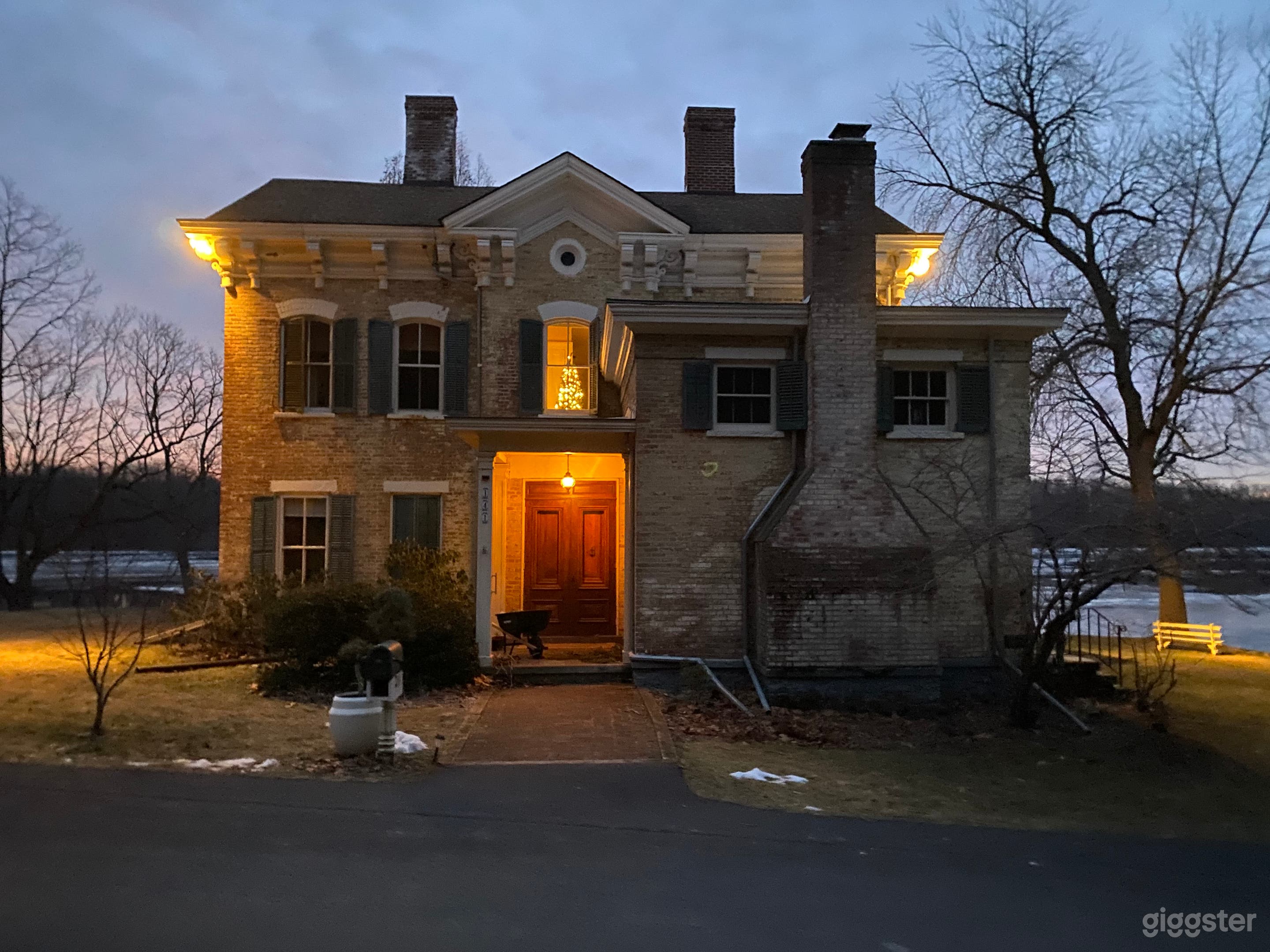 Night time view of house in winter.