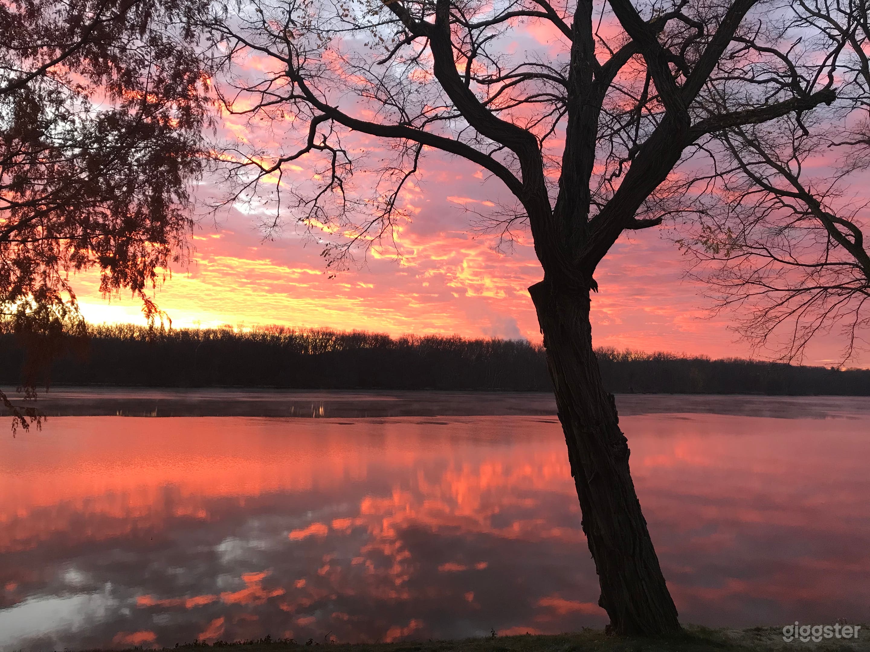 Sunrise reflected in the river,N  looking south east 