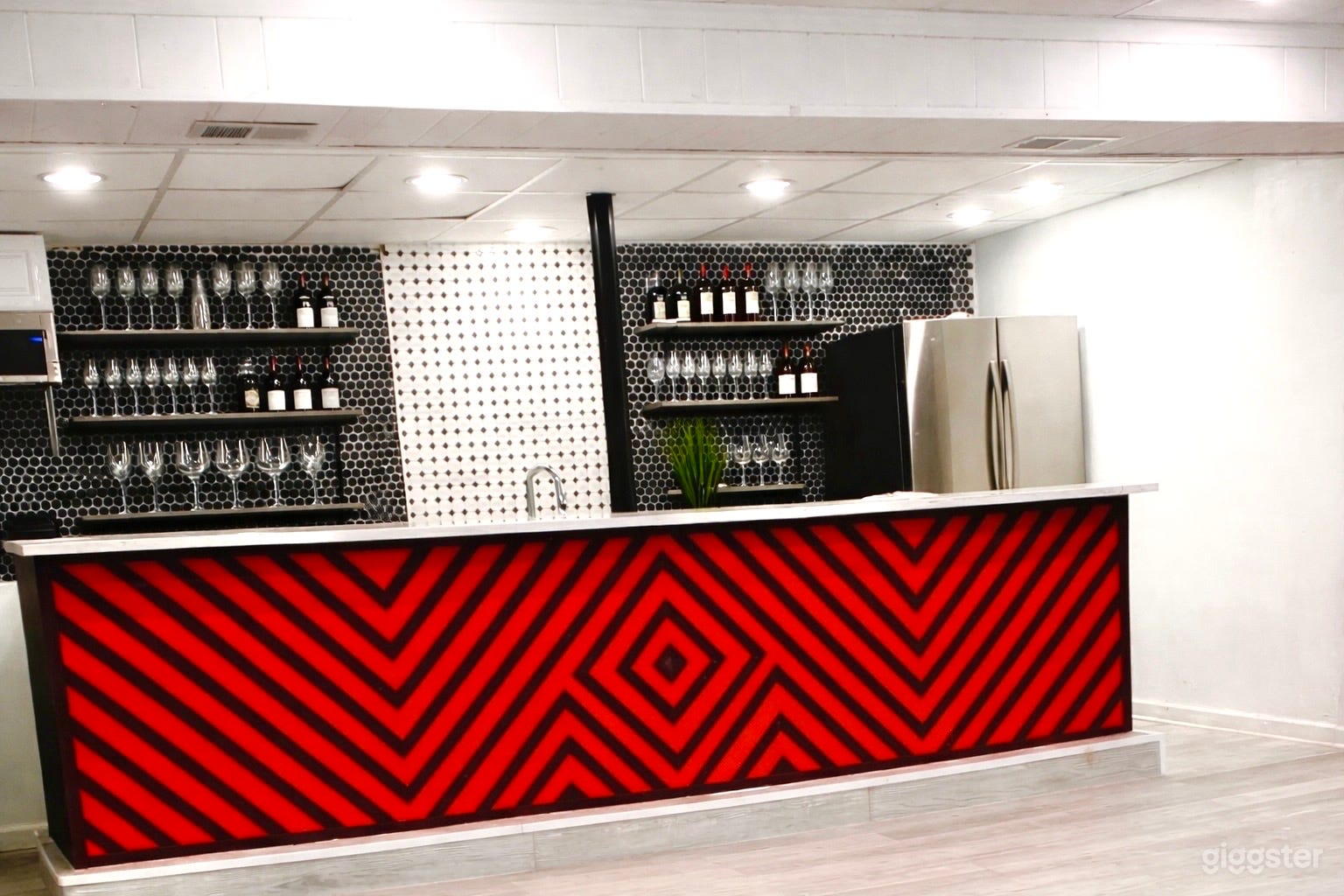 Bold Basement Film Studio with Iconic Bar Backdrop Photo 1