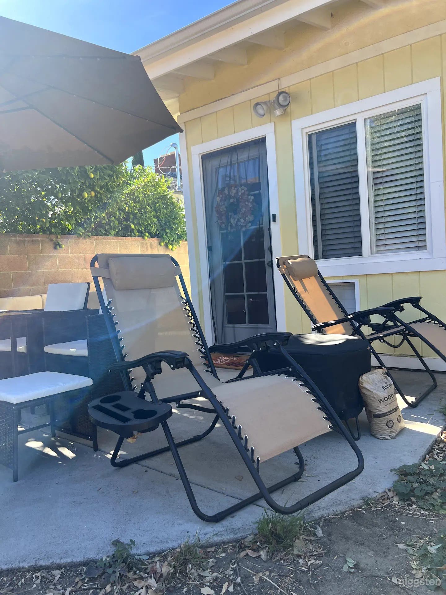 Two Zero Gravity loungers with a new fire pit in between for your outdoor relaxation