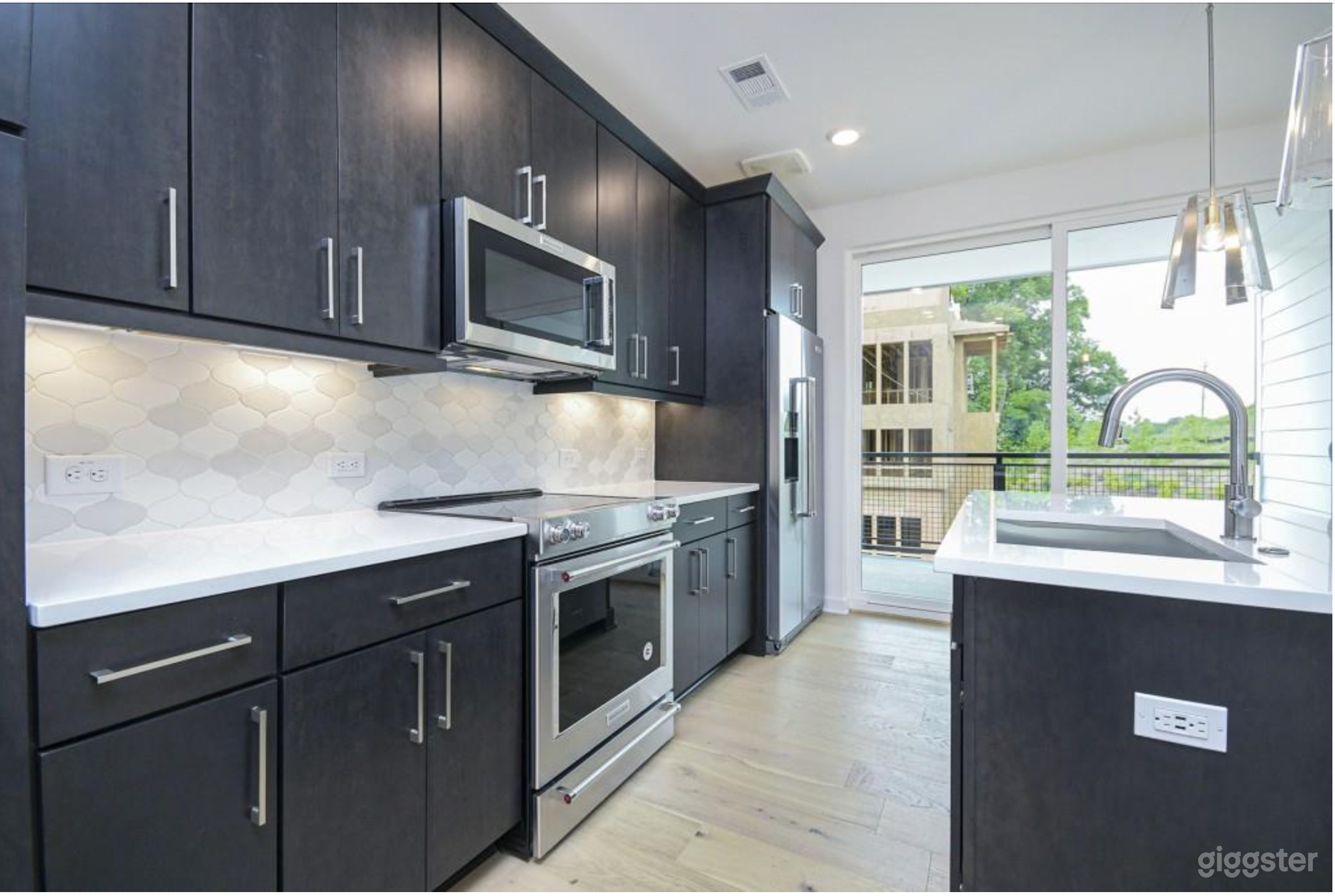 Kitchen with sliding glass view (just updated: large glass tabletop and chairs)