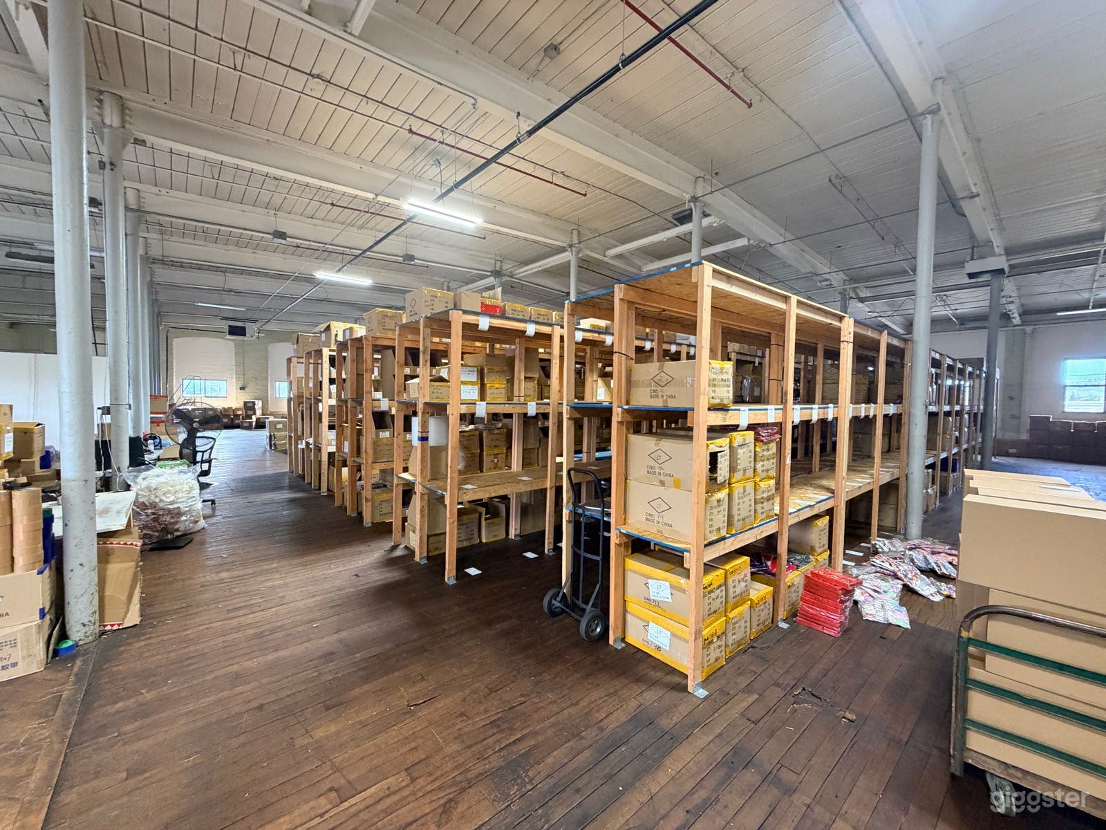 Large warehouse with high ceilings, wood shelves & daylight Photo 2