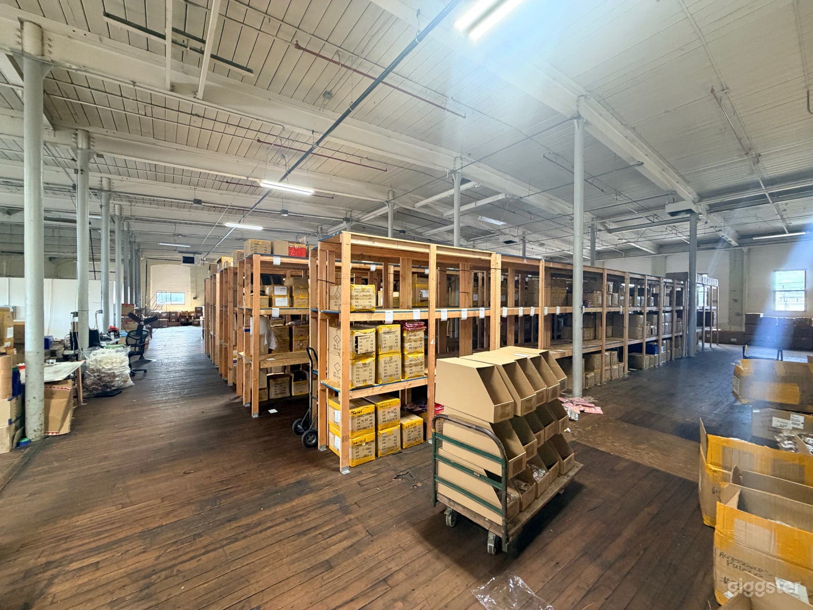 Large warehouse with high ceilings, wood shelves & daylight Photo 3
