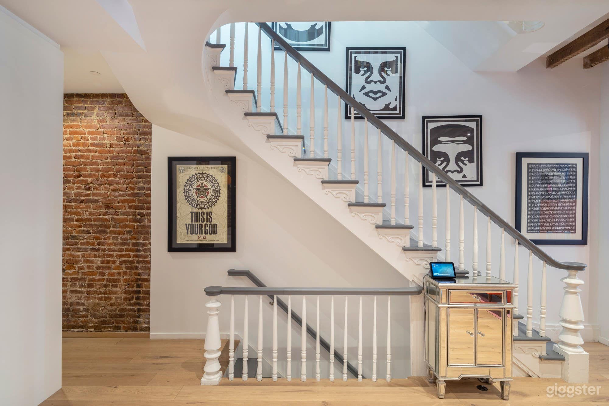 Original staircase, Obey artwork, exposed brick