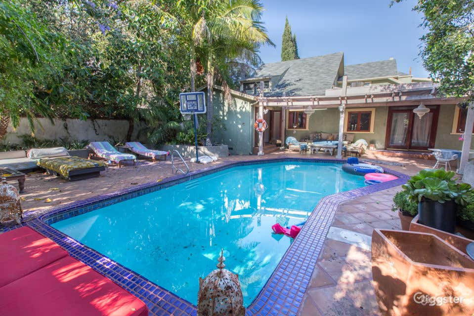 Lush Backyard Pool in a Bohemian Hollywood Hills Home Photo 1