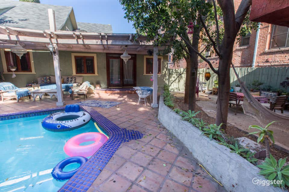 Lush Backyard Pool in a Bohemian Hollywood Hills Home Photo 3