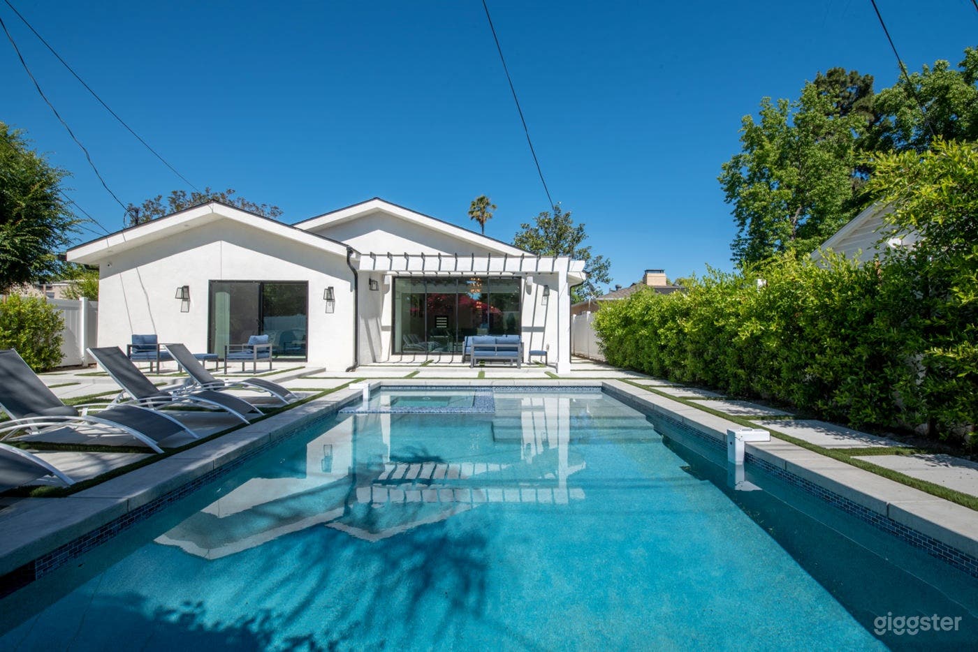Picturesque Pool with Pool House Photo 1
