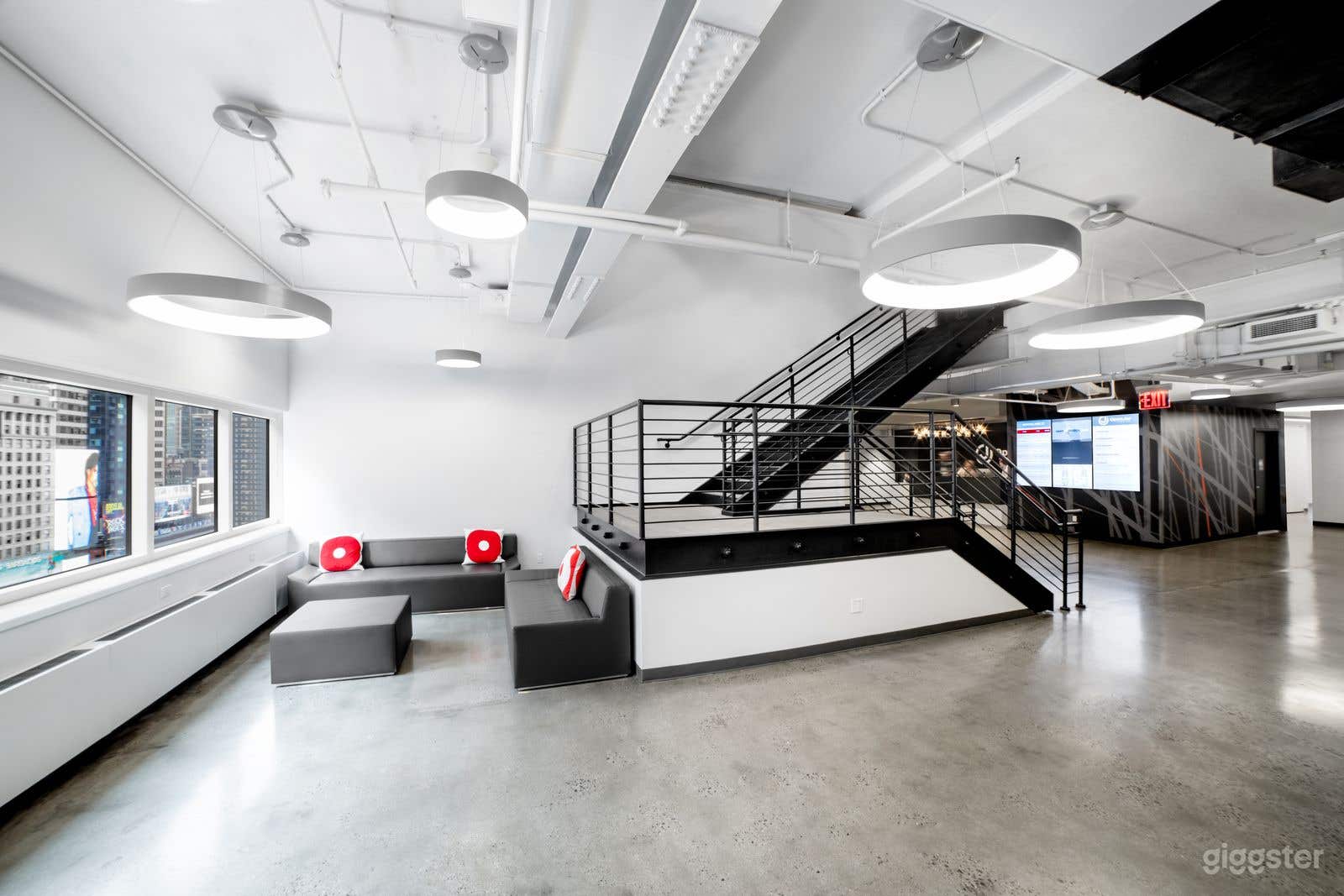 Complex features common area lounge with views of Times Square
