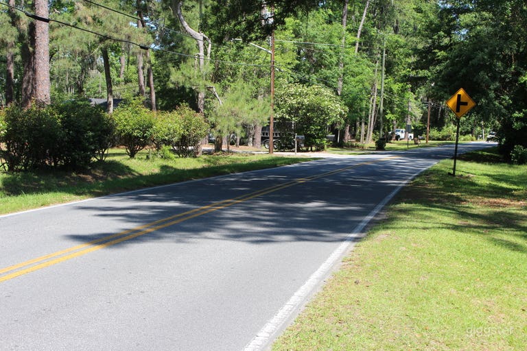  Mid-Century Brick Home on Expansive Riverfront Lot with Dock 