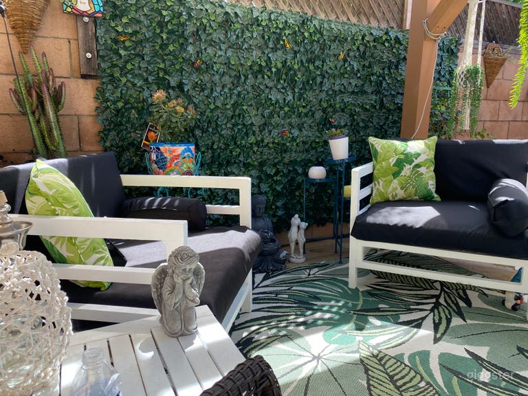  side yard with seating for 19 people, one short step to access from entry 