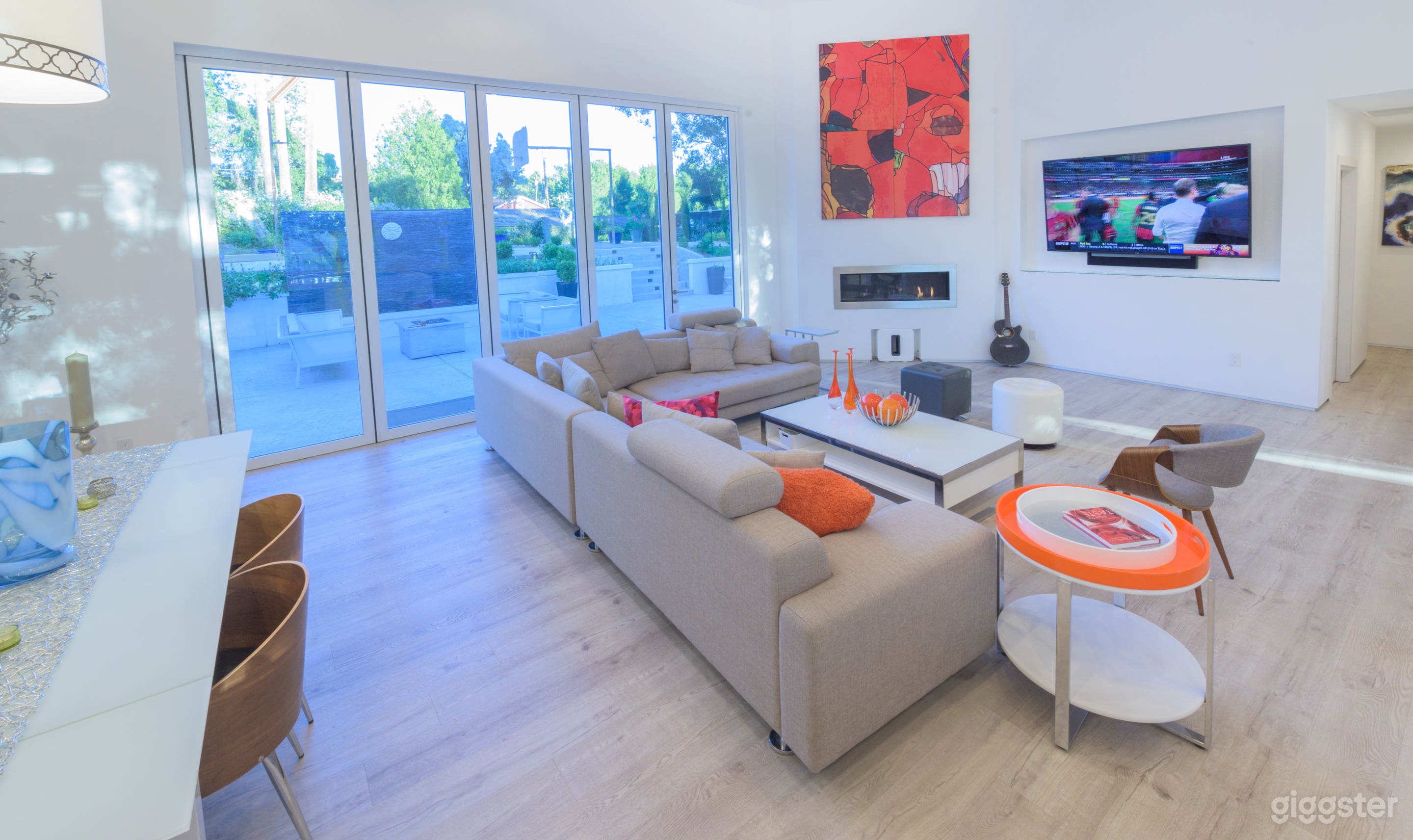 Huge 50 inch ultra modern fireplace.
85 inch TV.
In ceiling hidden speakers.
SONOS whole house audio system.