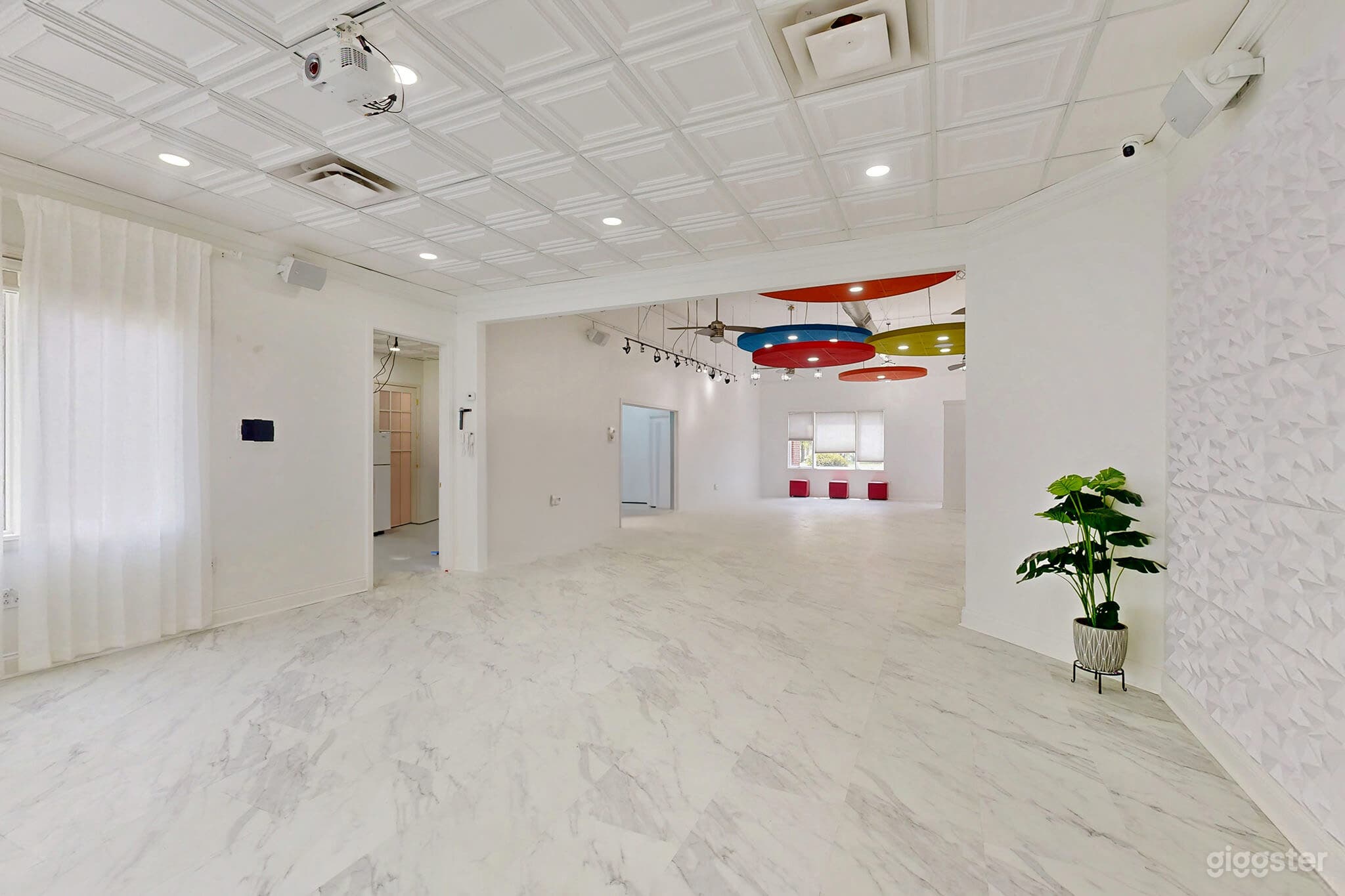 Overall view of white canvas venue