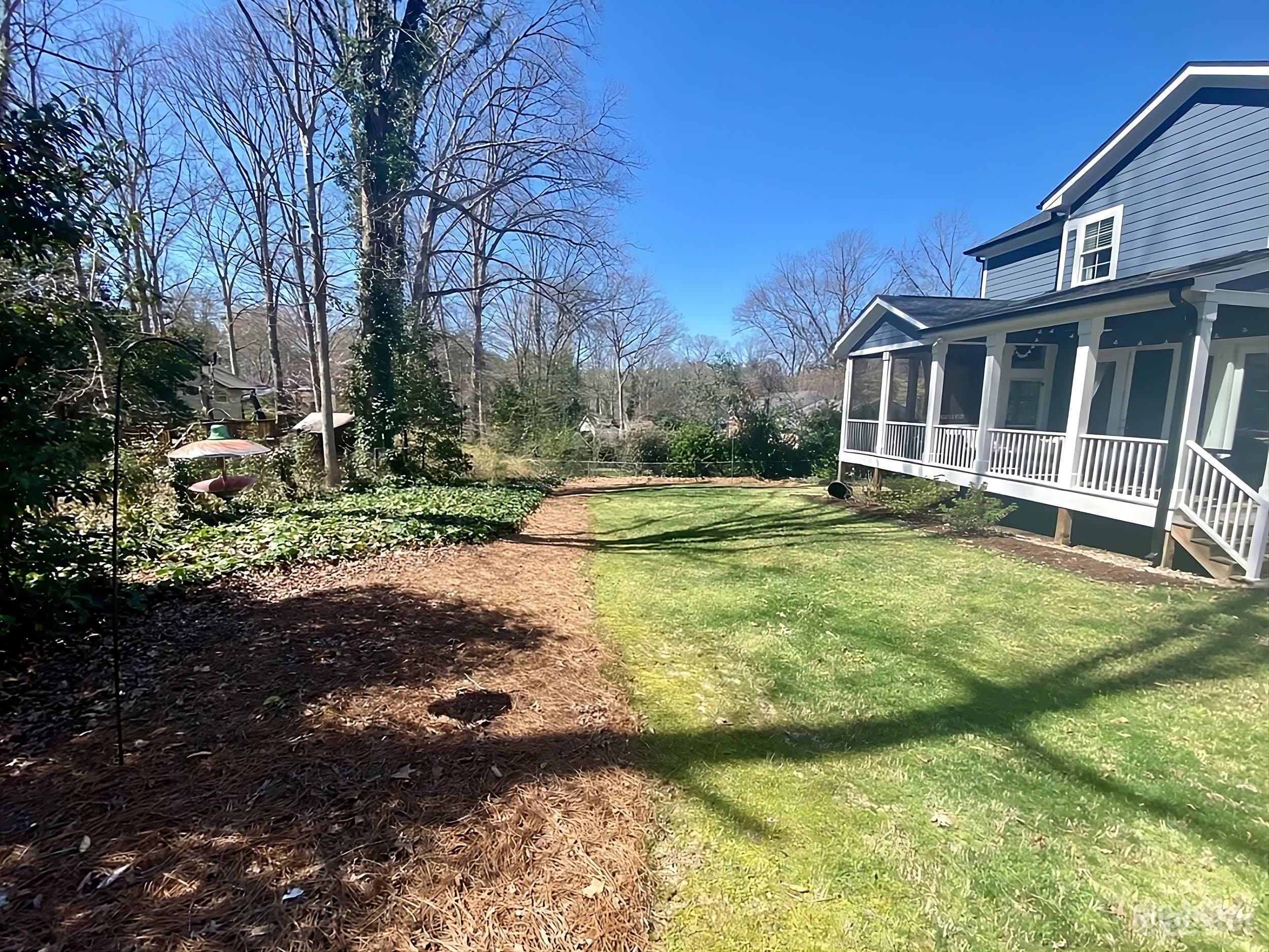 Charming Blue Home Backyard Photo 2