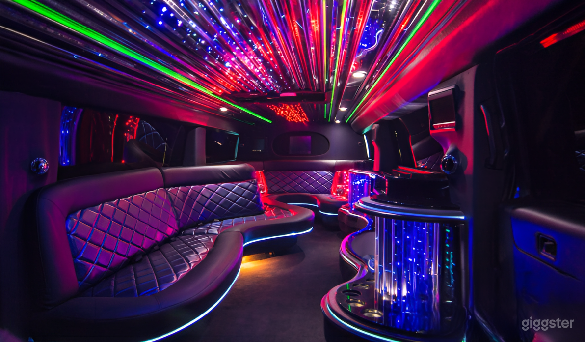 Ultra Stretch SUV Chauffeur Experience for 12 Guests Photo 2