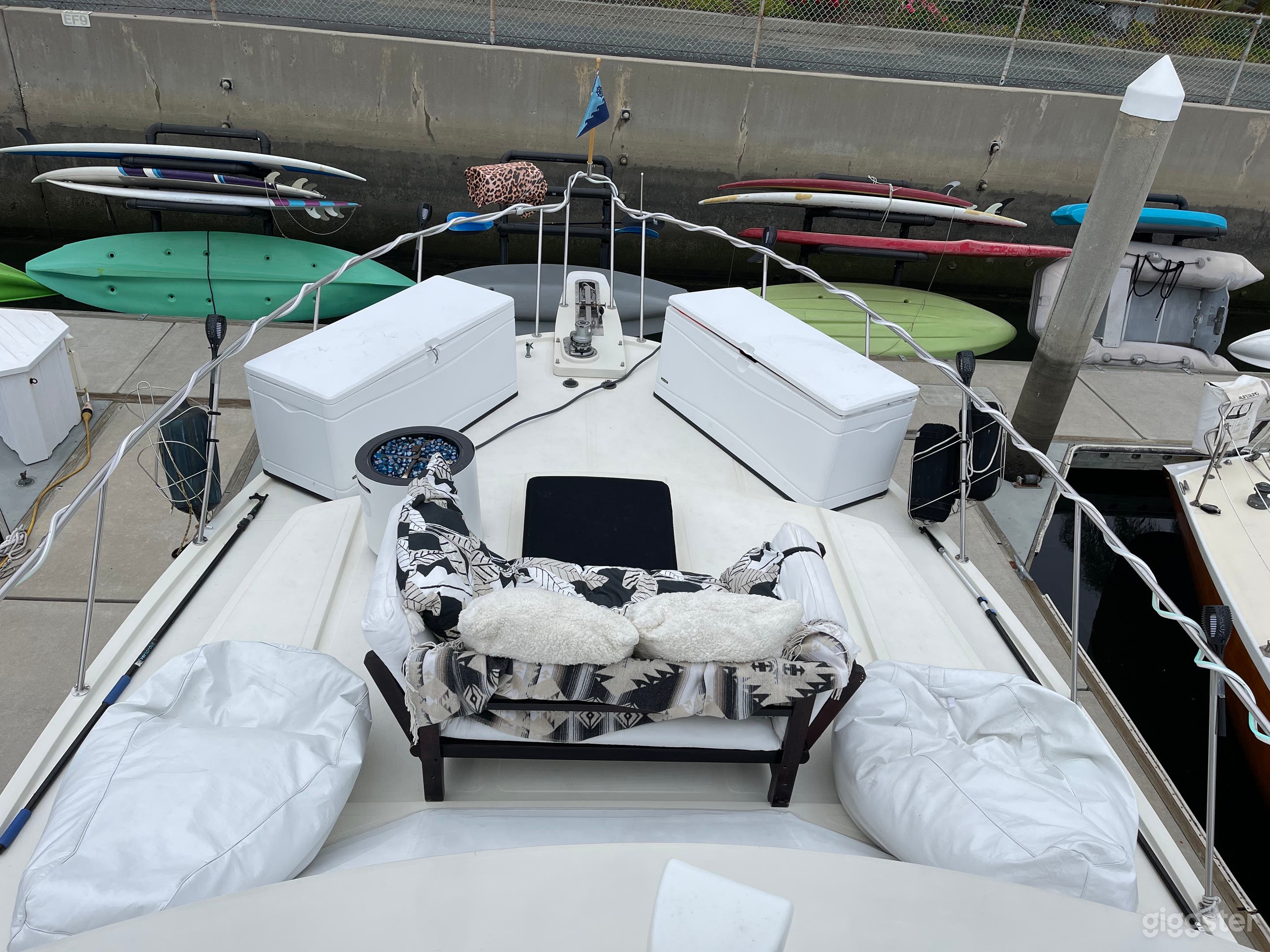 Very spacious bow. Dock boxes, fire pit and couch are all removable 