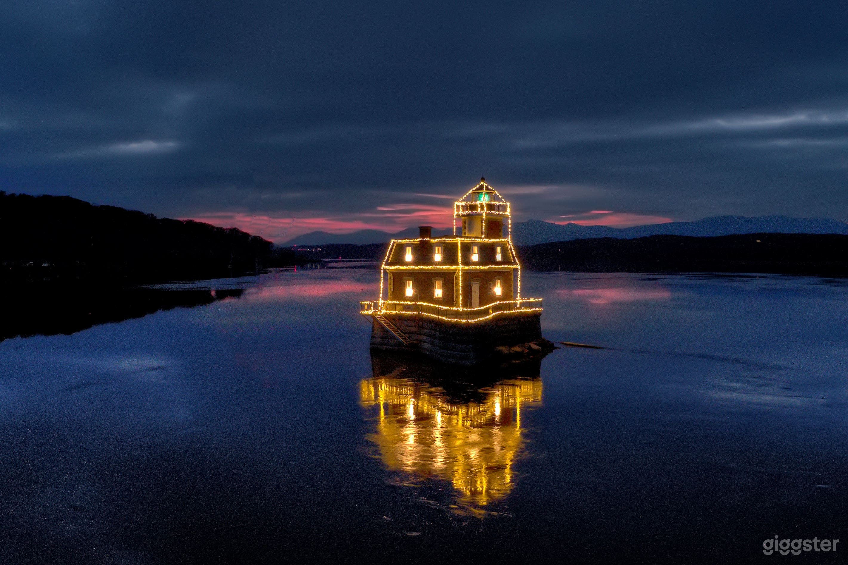 Lighthouse decorated in holiday lights