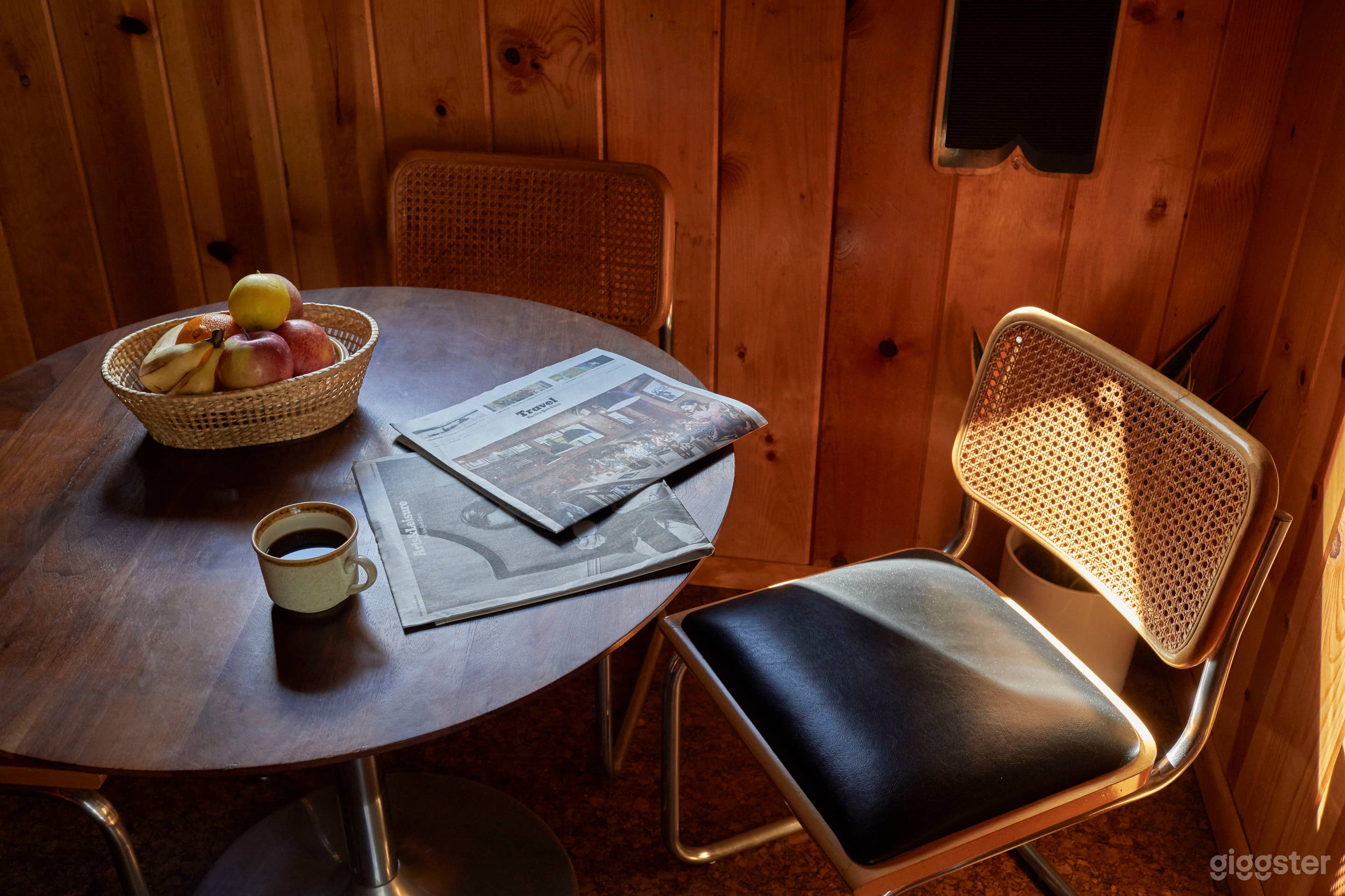 Mid Century cabin with fireplace in the middle.  Photo 3