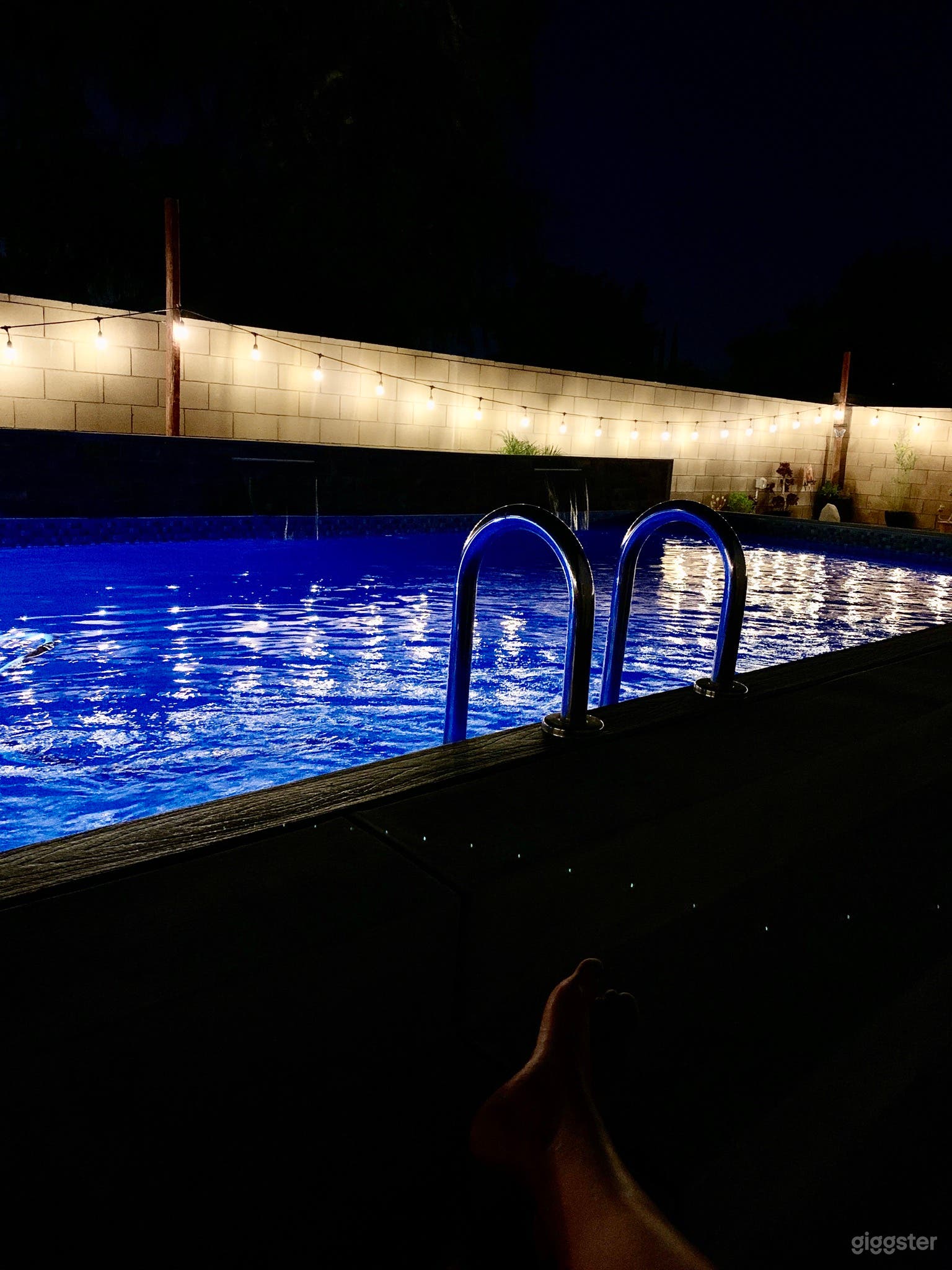 Beautiful night time lighting in backyard 