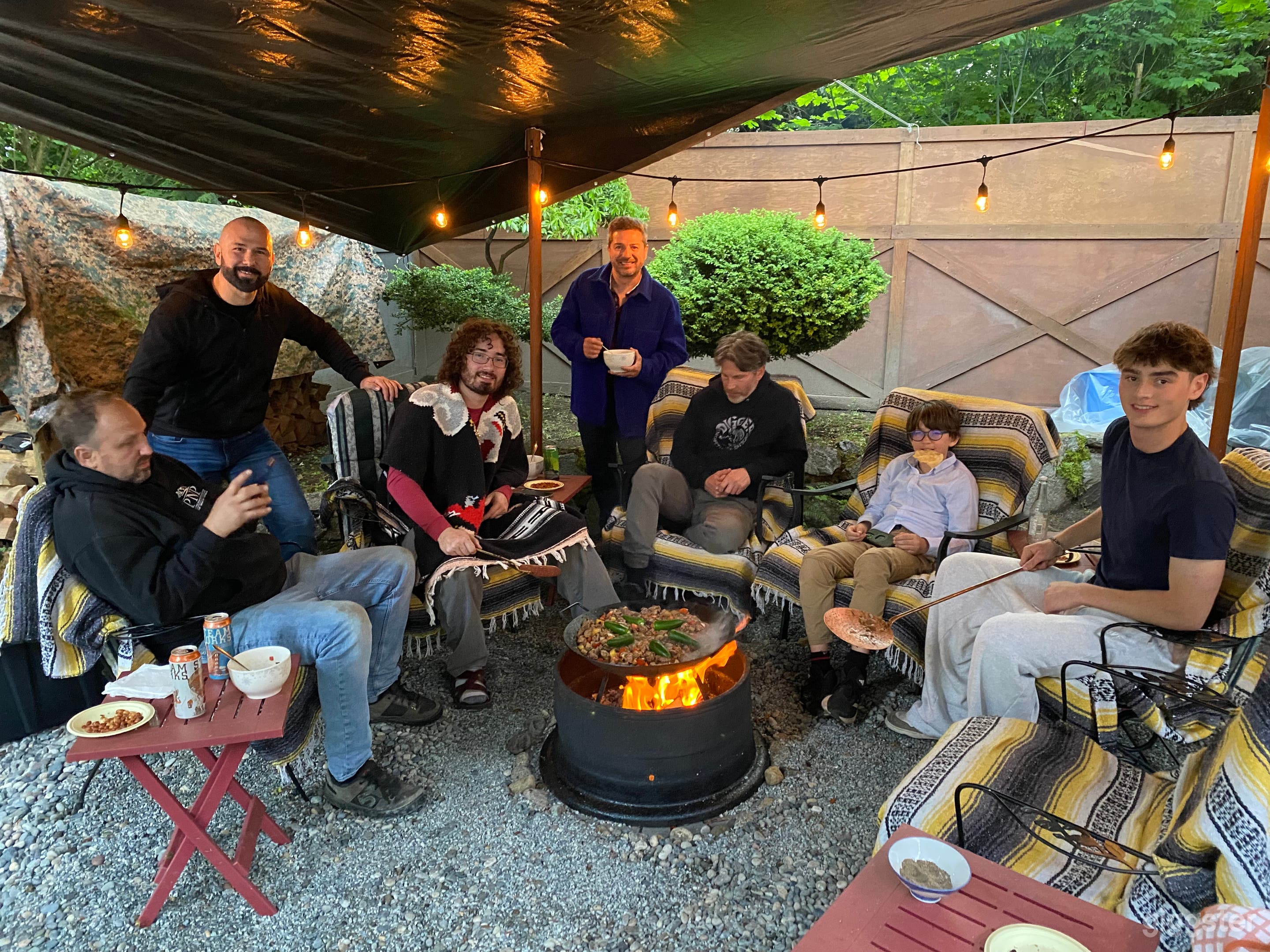 Charming Outdoor Firepit Lounge with Rustic Vibes Photo 4