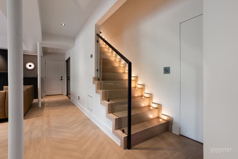  Custom staircase with glass and steel handrail. All basement lighting is dimmable  