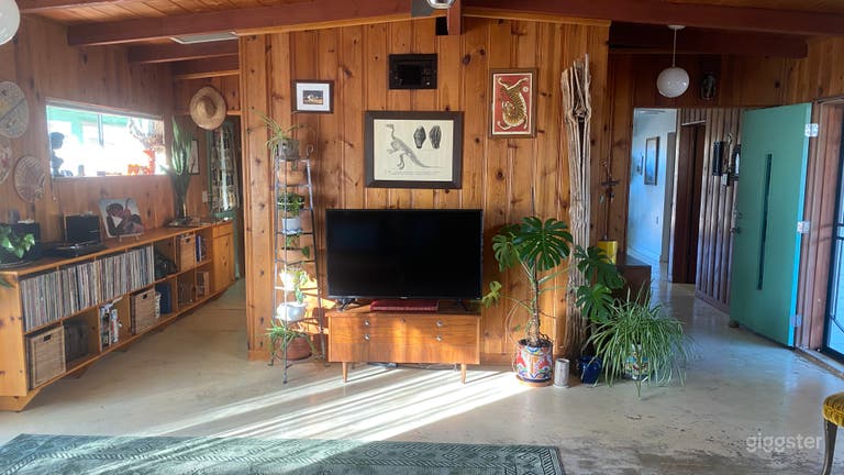  Living room, wood panel, concrete floor 
