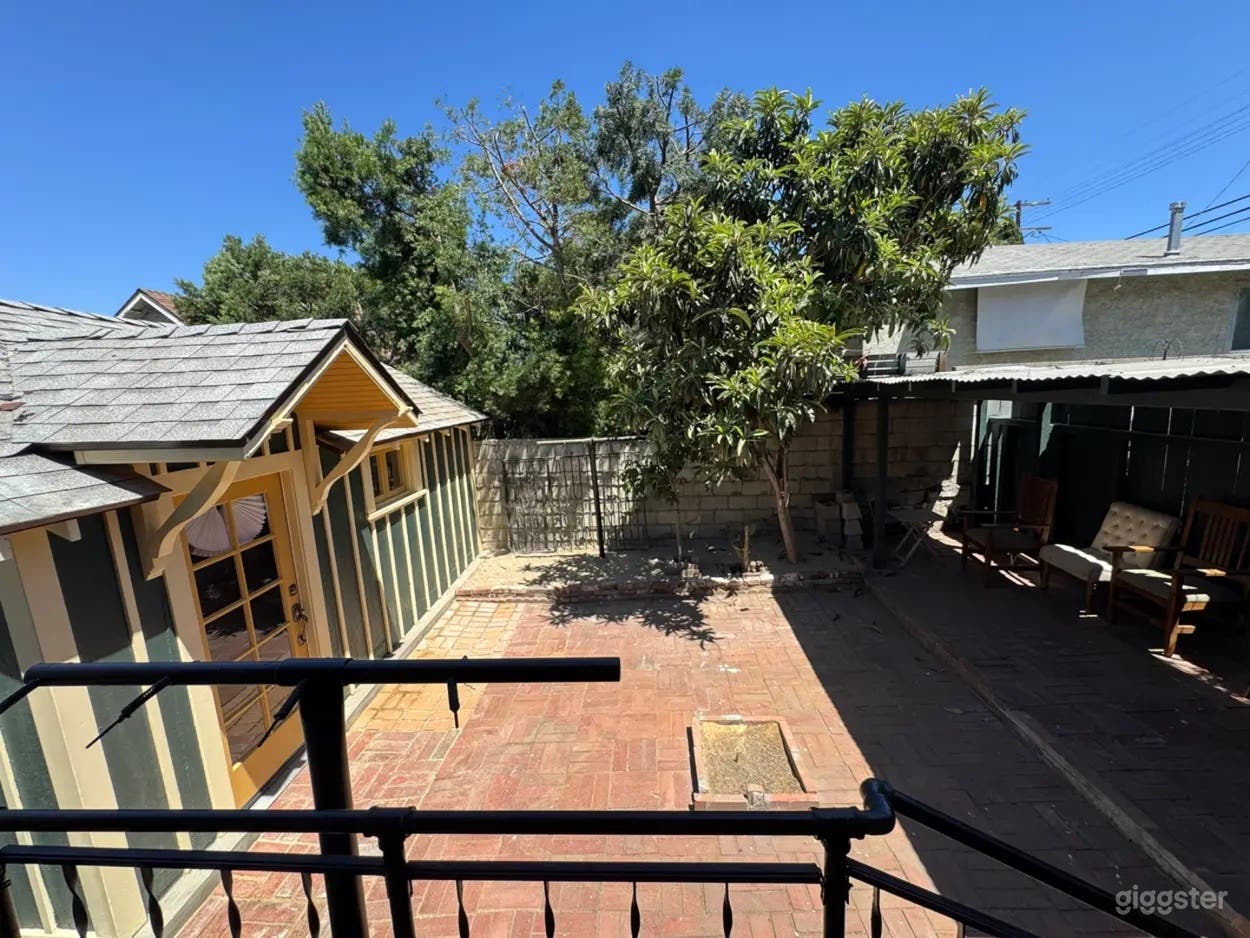 Rustic Backyard with Garage Photo 2