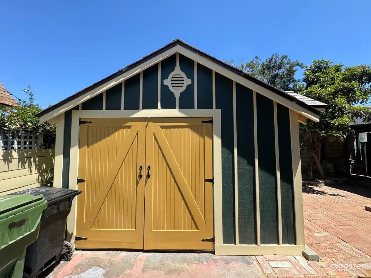 Rustic Backyard with Garage Photo 1